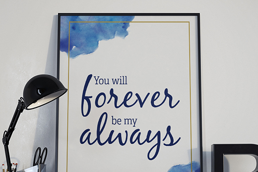 text and watercolor poster in a desk scene